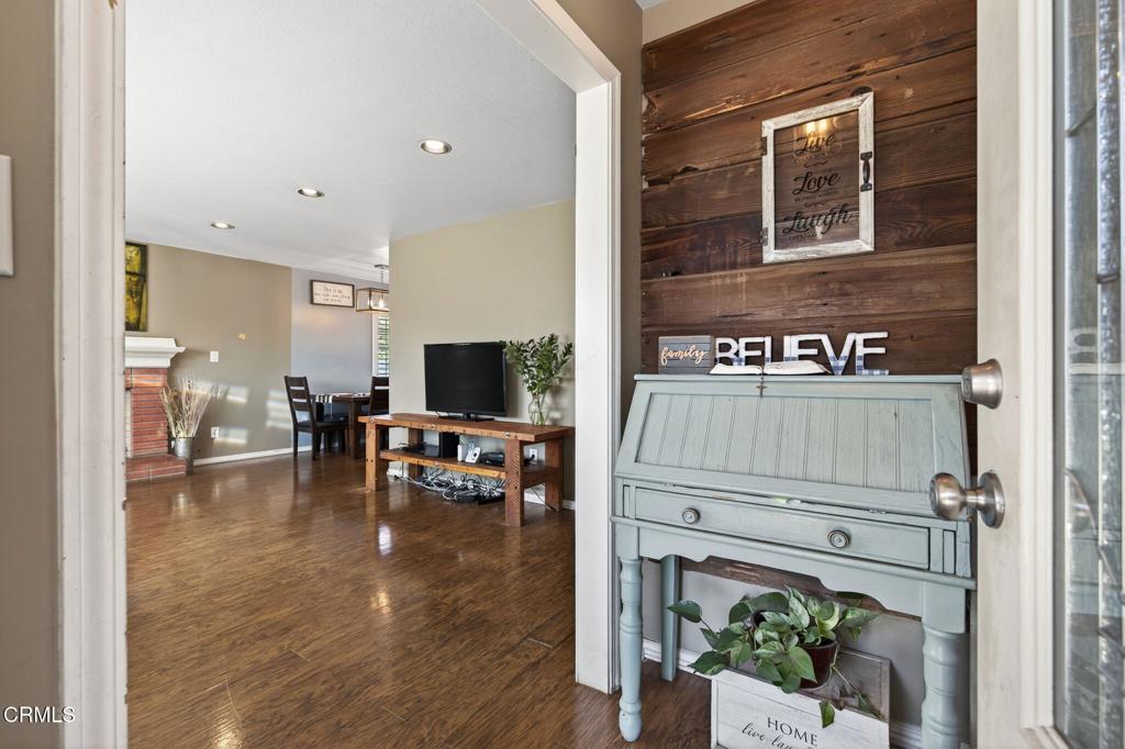 729 Ralph Way Santa Paula, CA 93060 - Photo 9 of 55 a living room with furniture and a flat screen tv