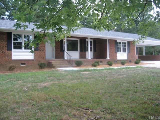 4208 Old Milburnie Road Raleigh, NC 27616 - Photo 1 of 12 front view of a house with a yard