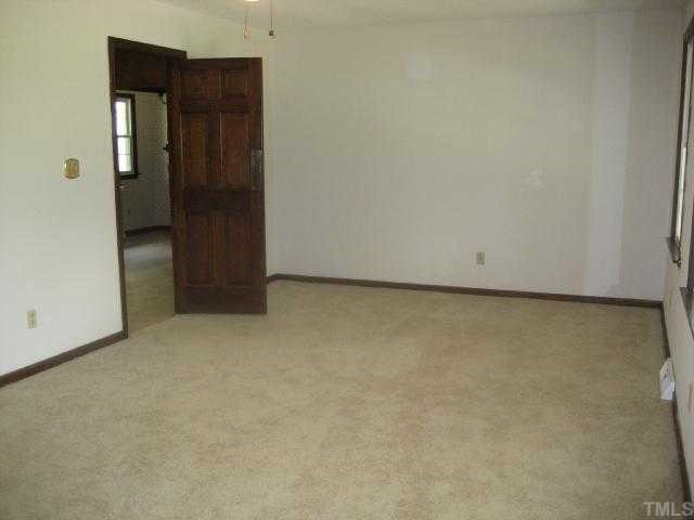 4208 Old Milburnie Road Raleigh, NC 27616 - Photo 4 of 12 a view of an empty room