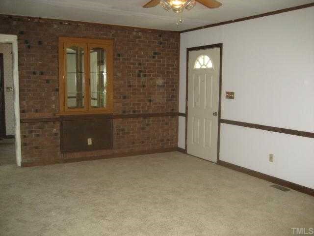 4208 Old Milburnie Road Raleigh, NC 27616 - Photo 8 of 12 wooden floor in an empty room