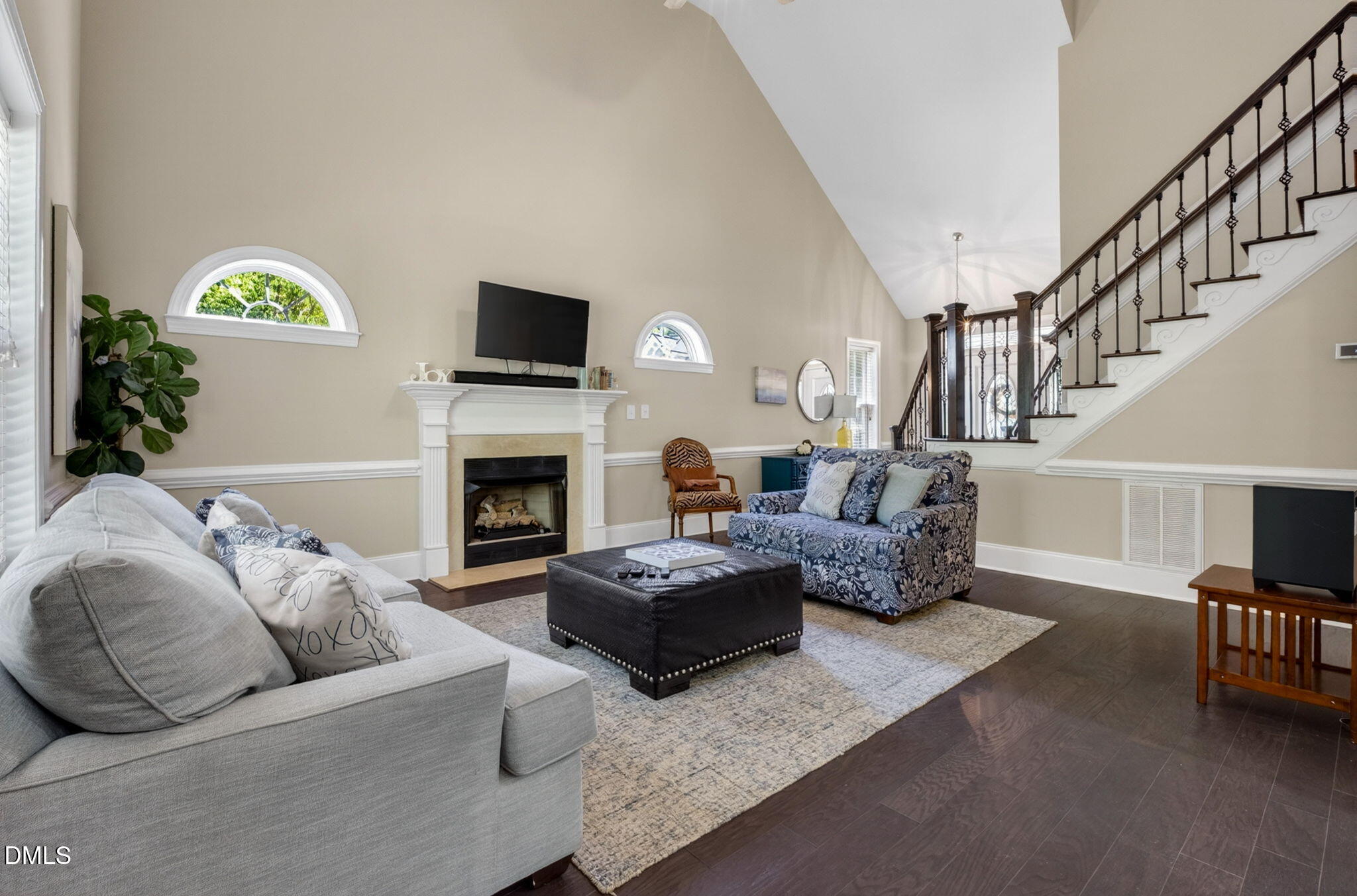 59 Ariel Court Garner, NC 27529 - Photo 11 of 36 a living room with furniture and a fireplace