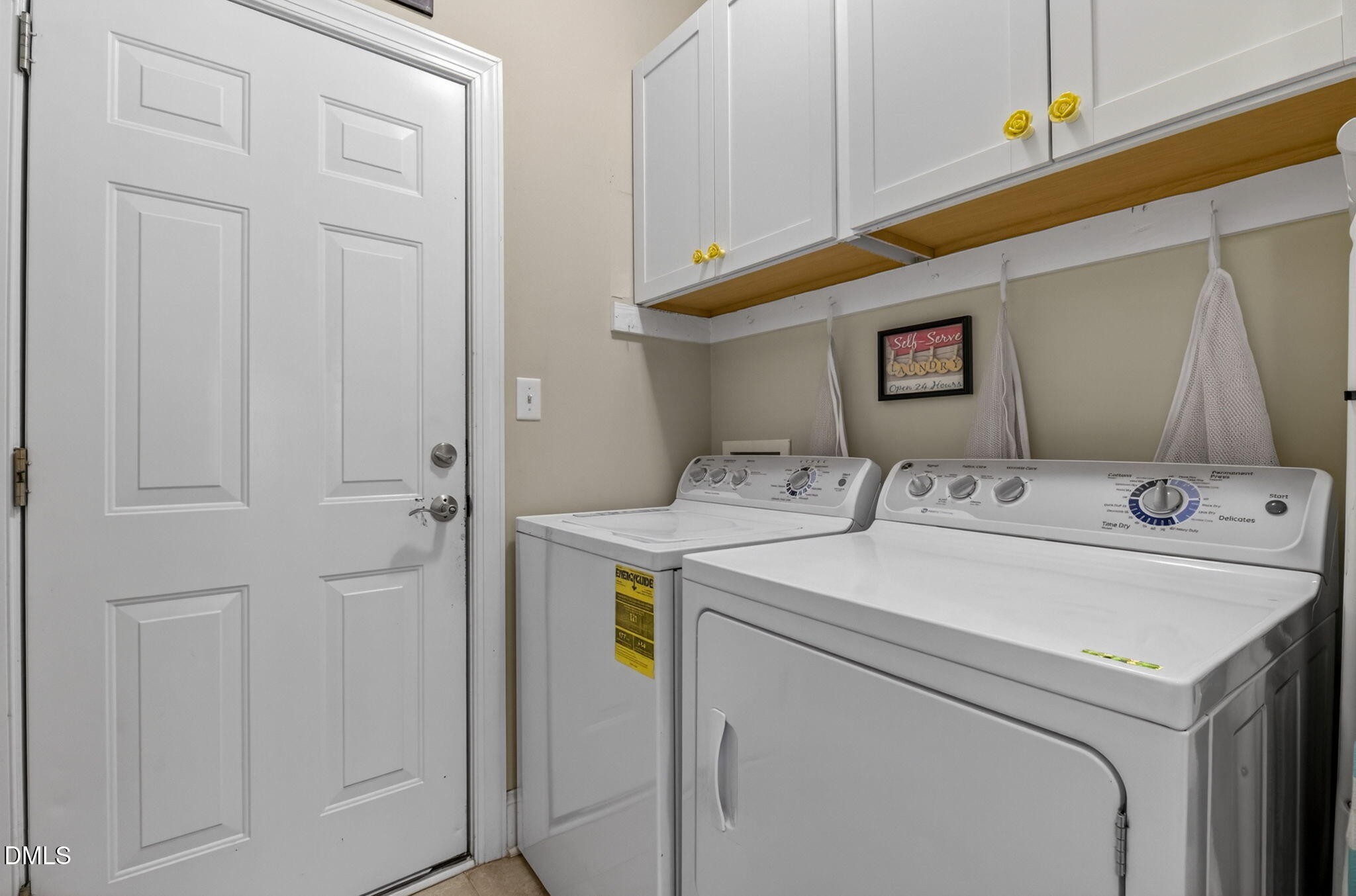 59 Ariel Court Garner, NC 27529 - Photo 18 of 36 a utility room with dryer and washer