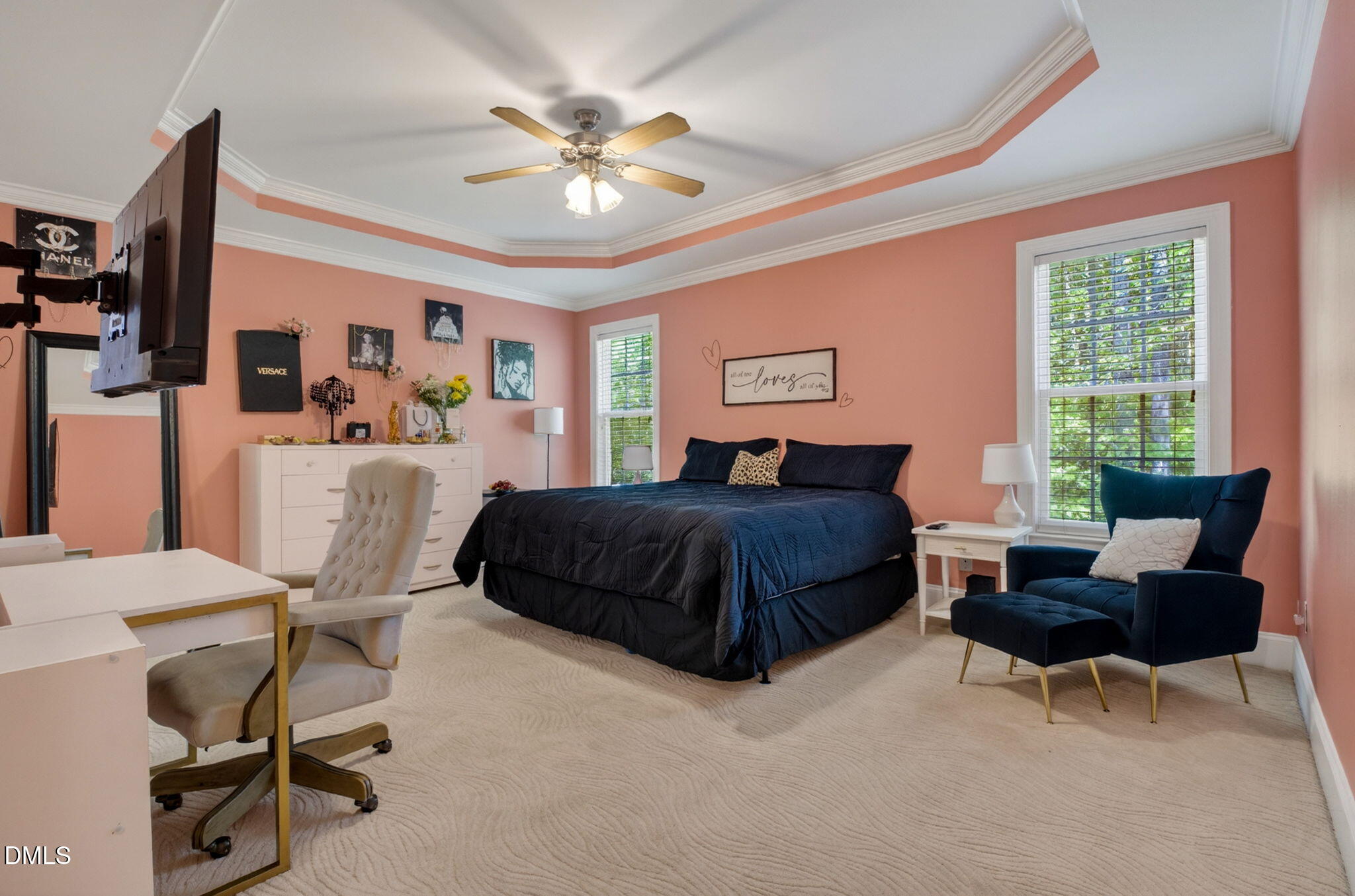 59 Ariel Court Garner, NC 27529 - Photo 20 of 36 a bedroom with a bed a chair and a chandelier
