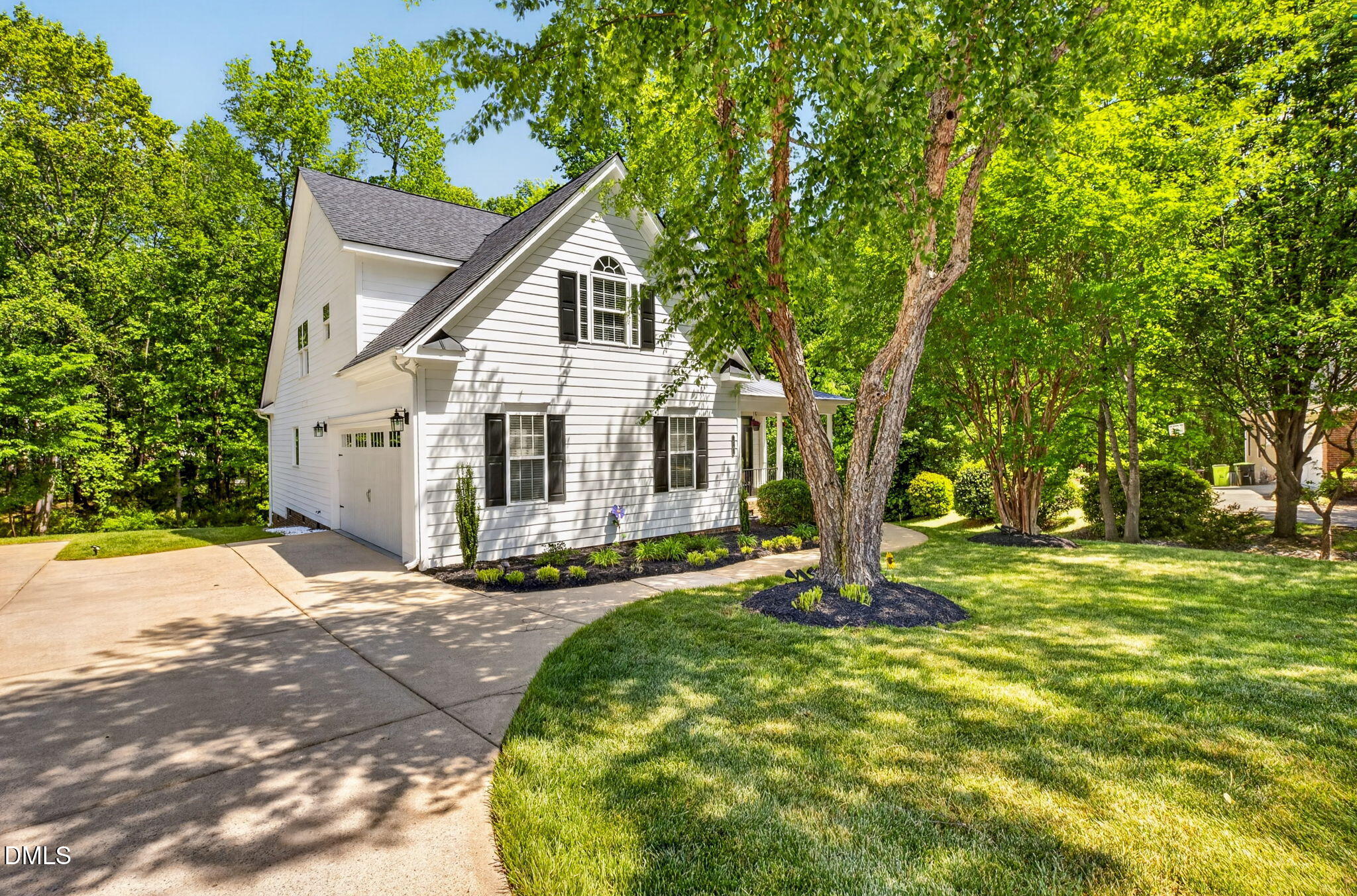 59 Ariel Court Garner, NC 27529 - Photo 2 of 36 a view of a house with backyard and trees