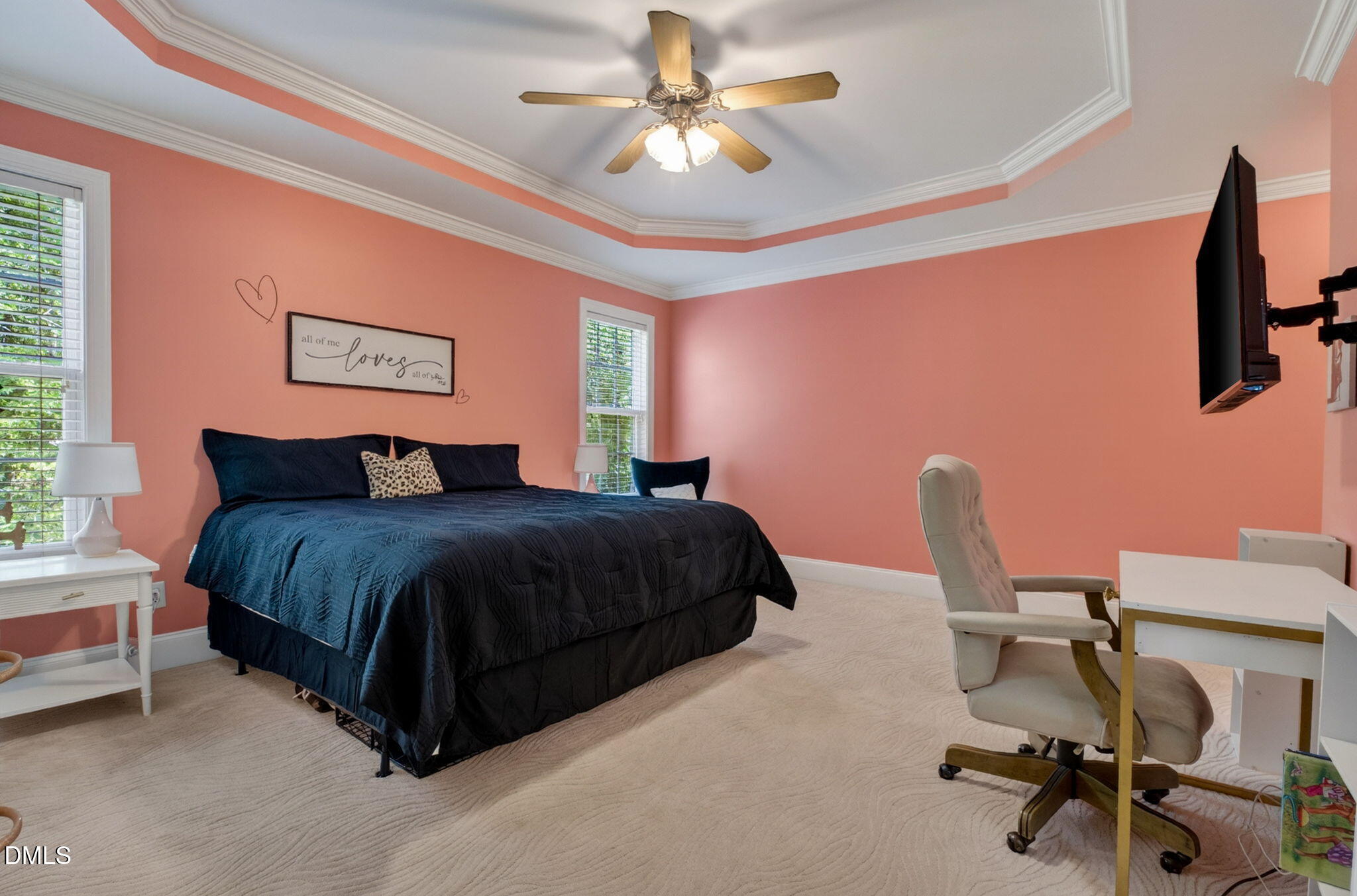 59 Ariel Court Garner, NC 27529 - Photo 21 of 36 a bedroom with a bed a chair and a chandelier
