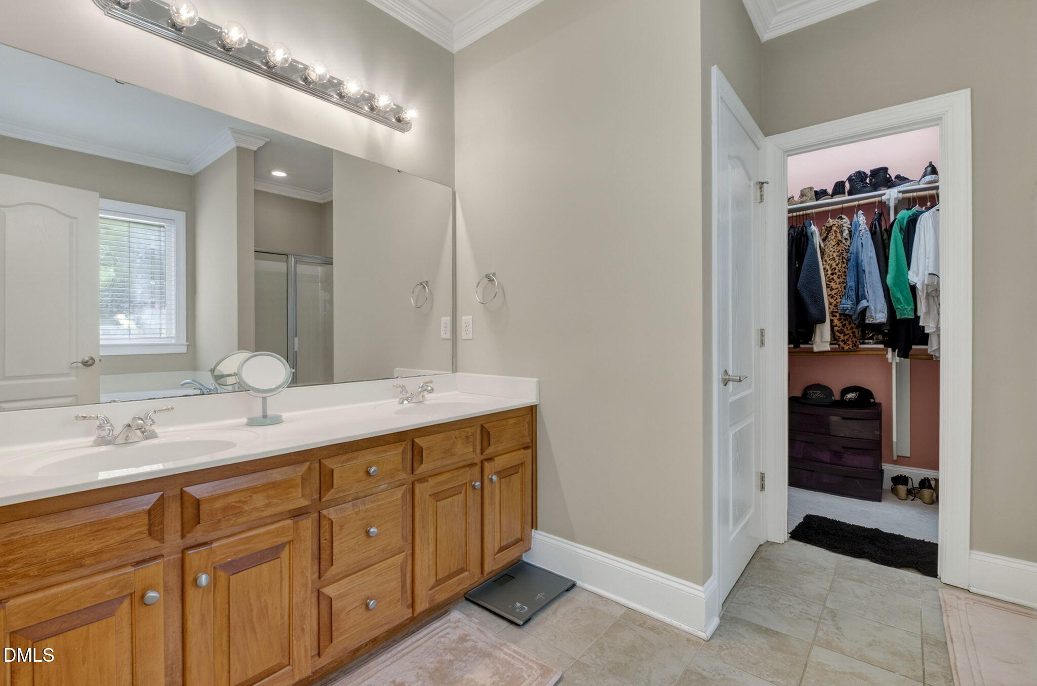 59 Ariel Court Garner, NC 27529 - Photo 22 of 36 a bathroom with a sink and a mirror
