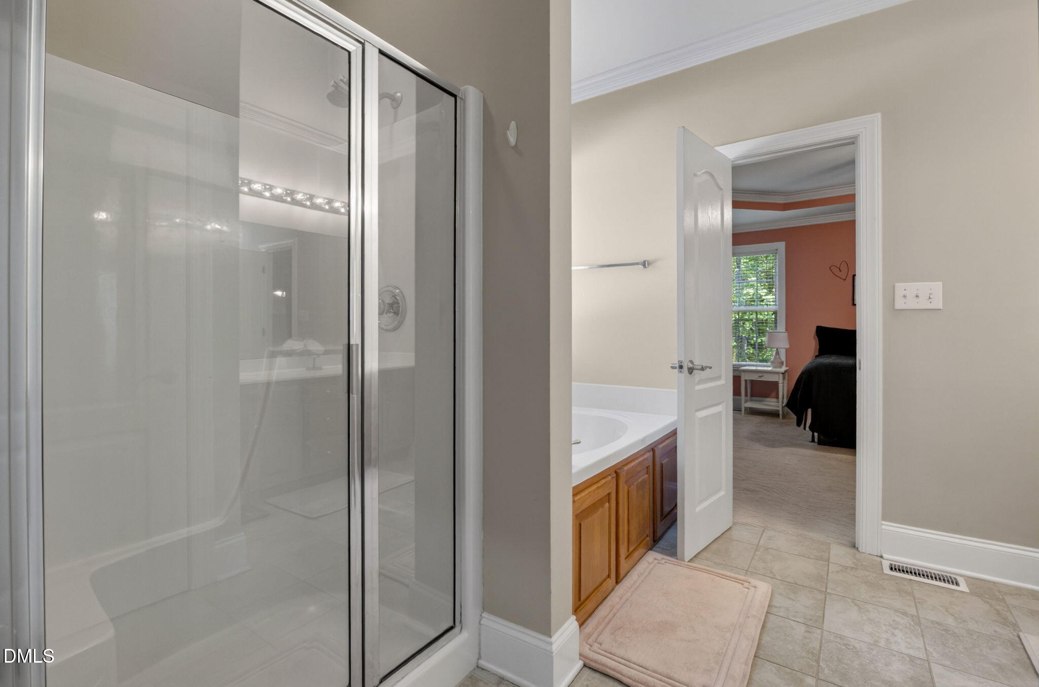 59 Ariel Court Garner, NC 27529 - Photo 23 of 36 a bathroom with a bathtub and a sink