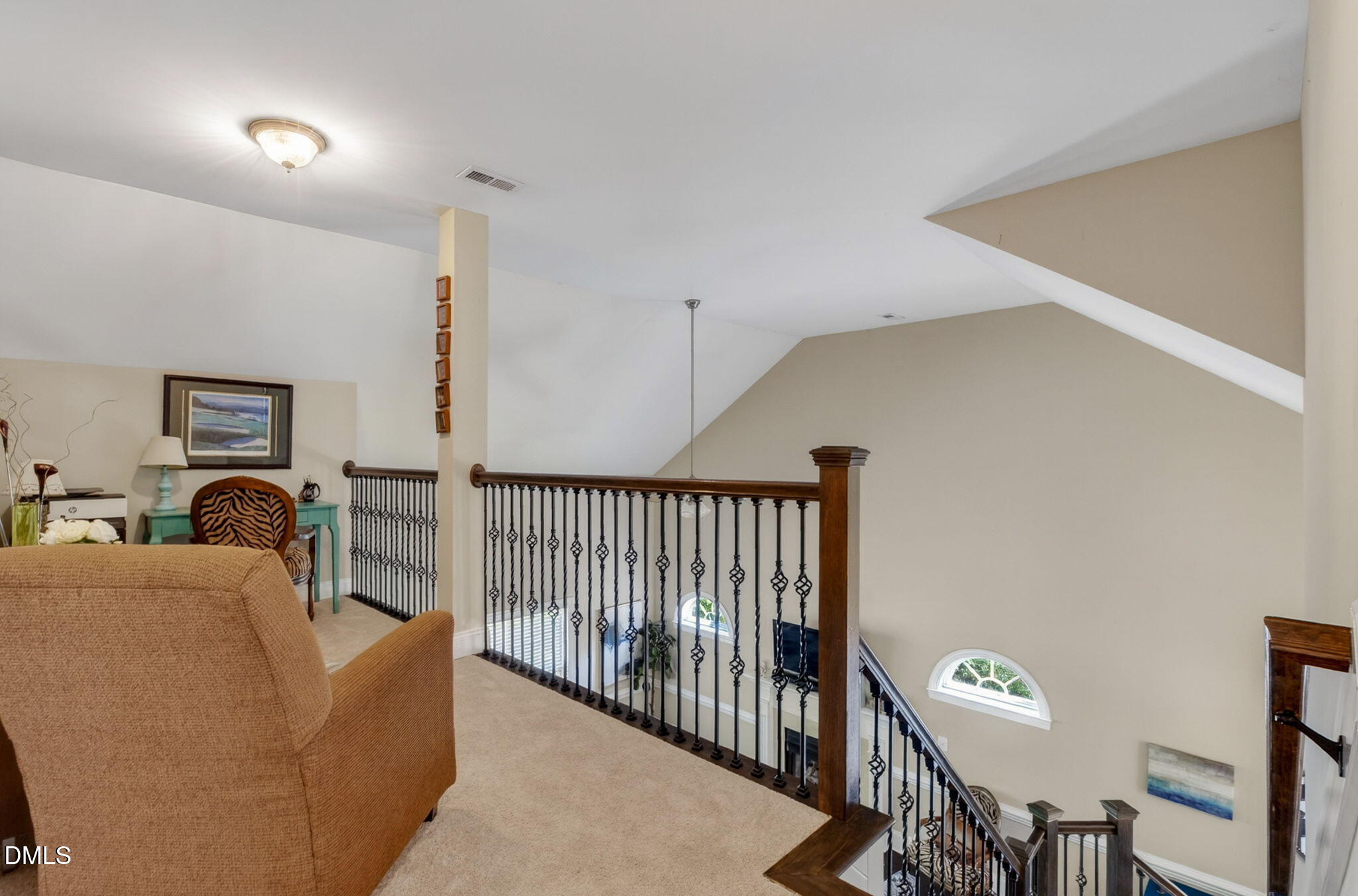 59 Ariel Court Garner, NC 27529 - Photo 25 of 36 a living room with furniture a window and a wooden floor