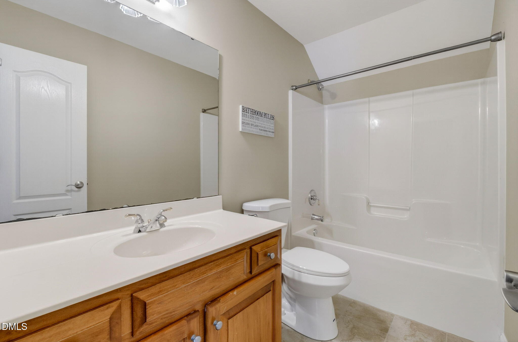 59 Ariel Court Garner, NC 27529 - Photo 26 of 36 a bathroom with a sink a toilet and shower