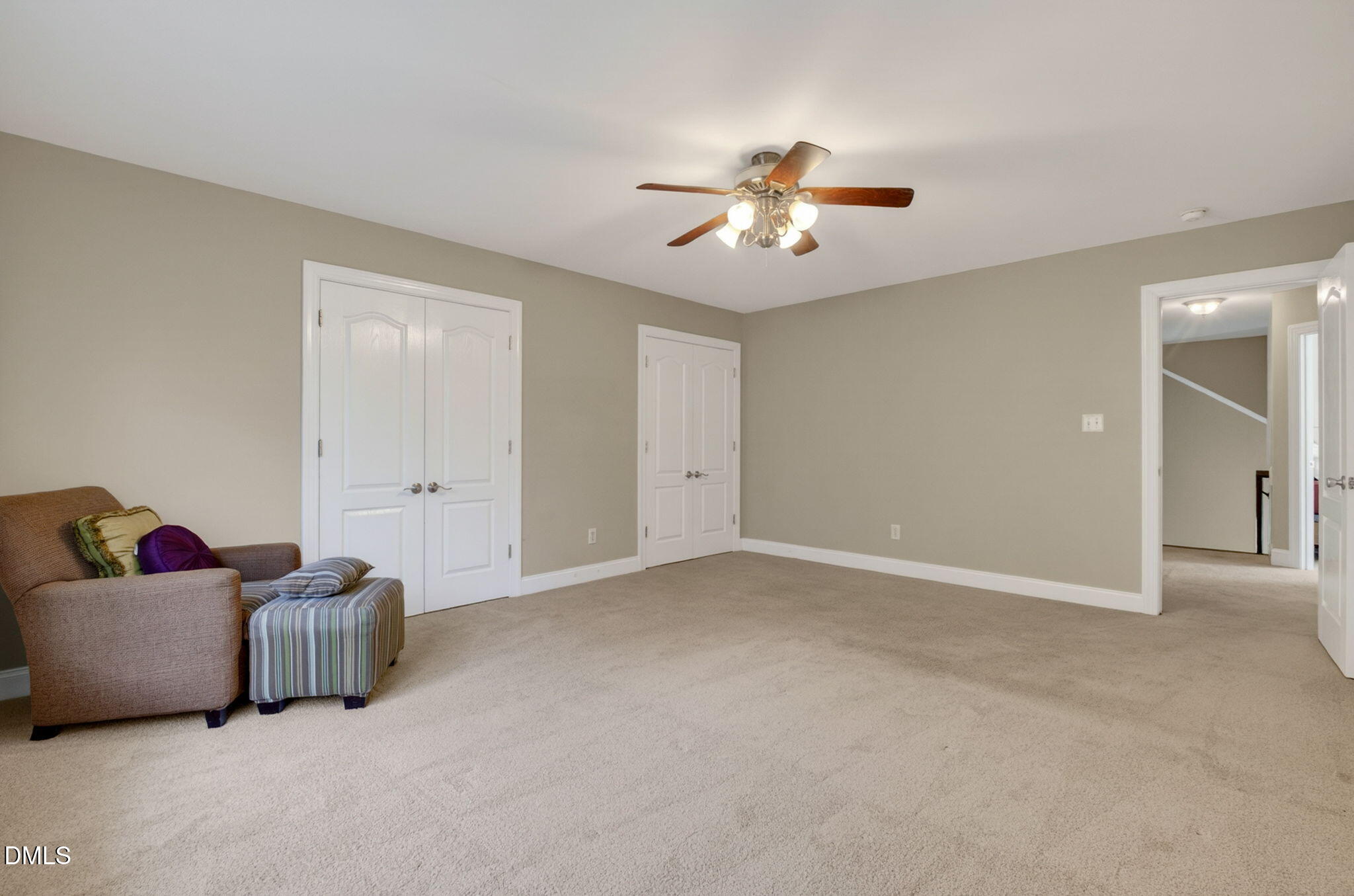 59 Ariel Court Garner, NC 27529 - Photo 28 of 36 a living room with furniture and a ceiling fan