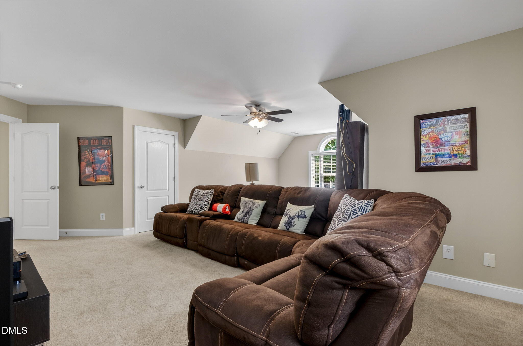59 Ariel Court Garner, NC 27529 - Photo 33 of 36 a living room with furniture and a ceiling fan