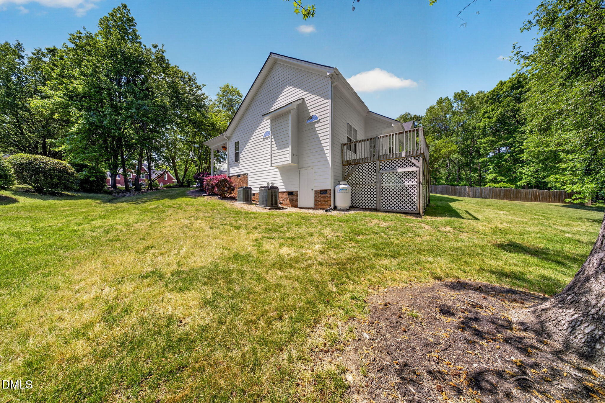 59 Ariel Court Garner, NC 27529 - Photo 35 of 36 a view of a house with a yard