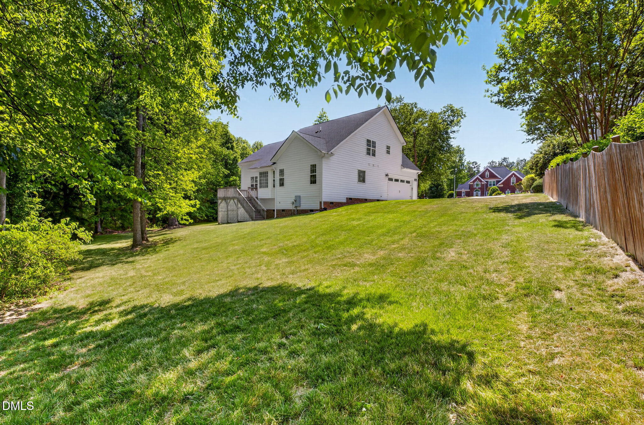 59 Ariel Court Garner, NC 27529 - Photo 36 of 36 a view of a house with a yard and tree