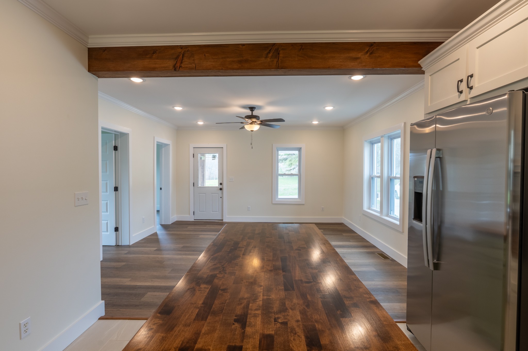 402 West Commerce Street Loretto, TN 38469 - Photo 13 of 23 a view of hallway with a window and wooden floor