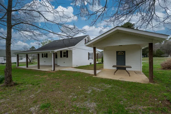 a house view with a garden space