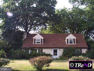 55 Glen Riddle Road Media, PA 19063 - Photo 1 of 1 a front view of a house with garden