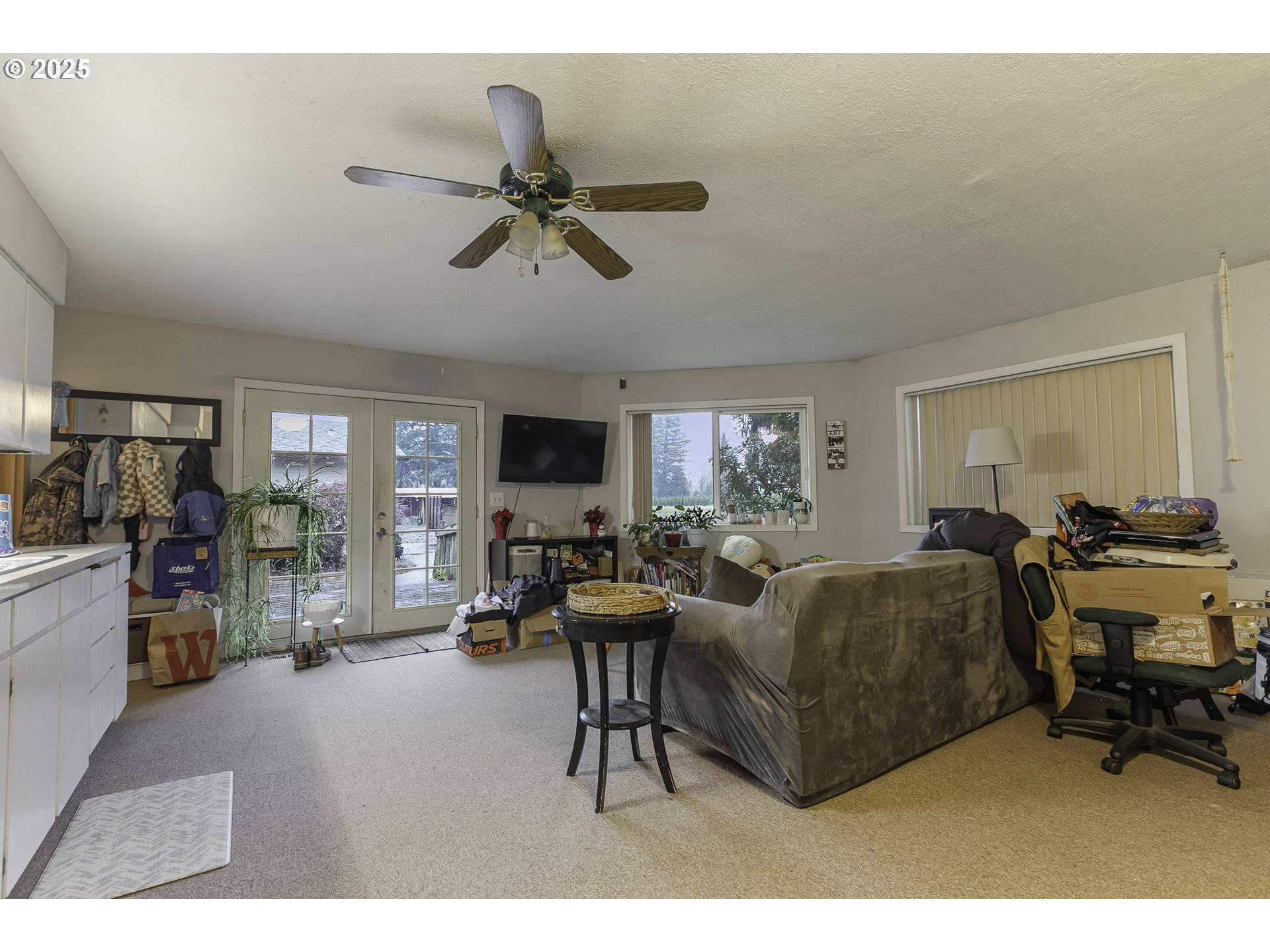 35730 Southeast Lusted Road Boring, OR 97009 - Photo 15 of 36 a living room with furniture and a flat screen tv