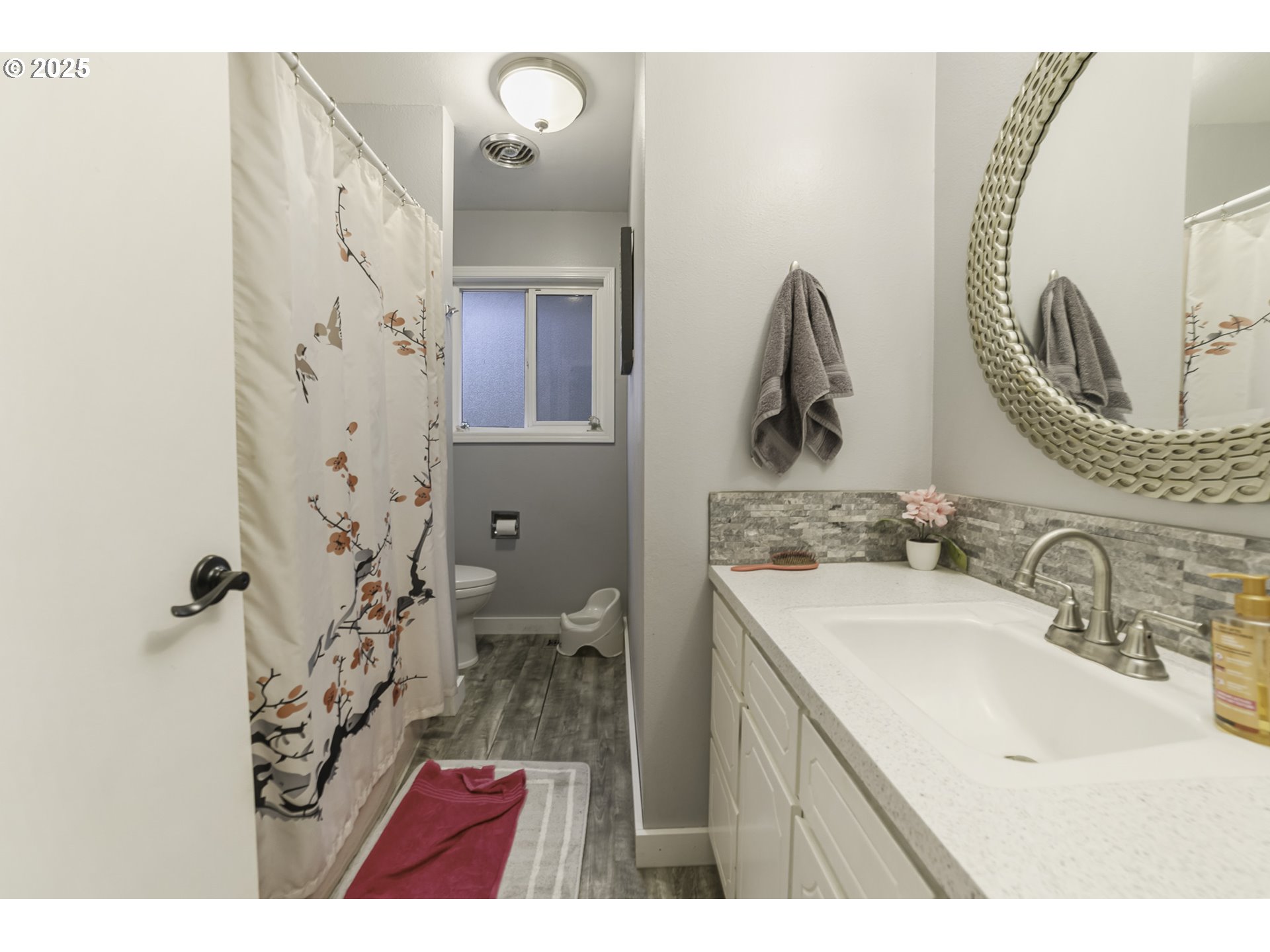 35730 Southeast Lusted Road Boring, OR 97009 - Photo 16 of 36 a bathroom with a sink and mirror with toilet