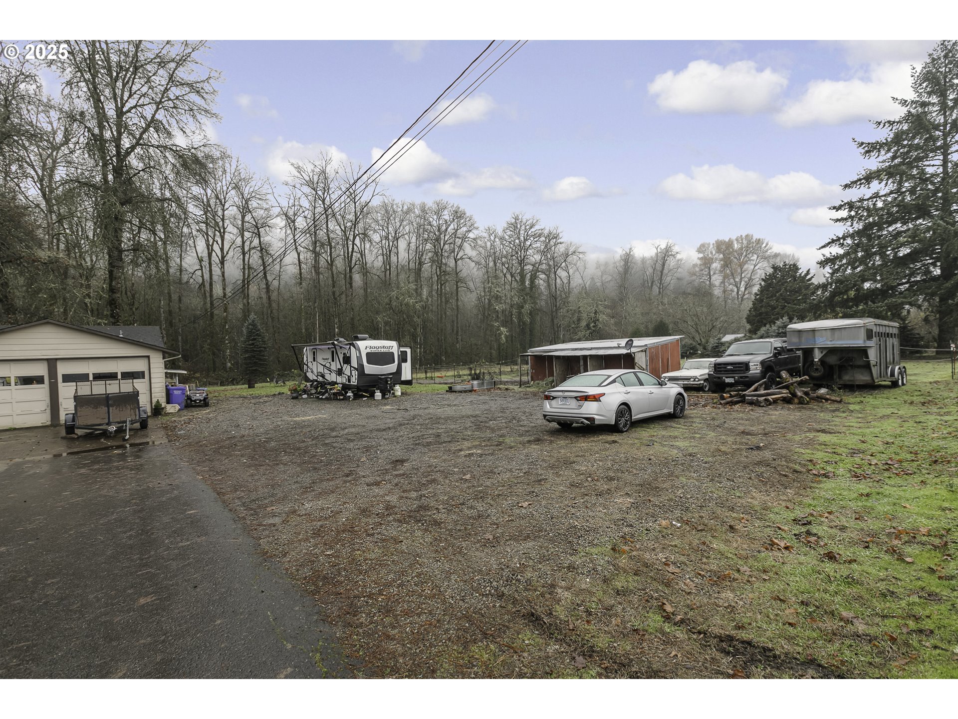 35730 Southeast Lusted Road Boring, OR 97009 - Photo 21 of 36 a car parked in front of a white house
