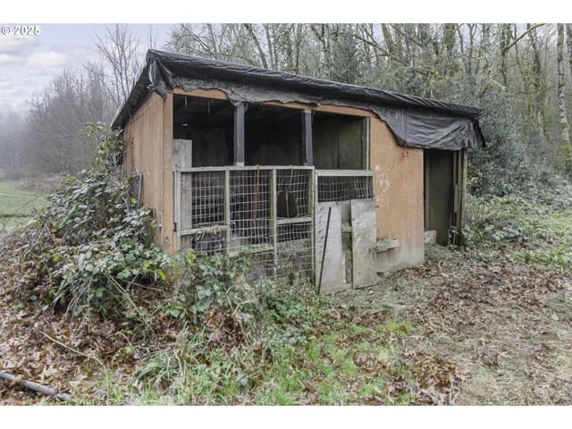 a house with trees in the background