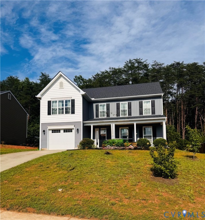 335 Cardinal Road Louisa, VA 23093 - Photo 1 of 1 Two-story residence featuring a covered front porc
