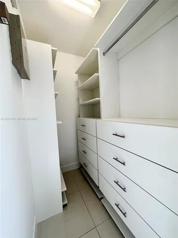 a view of swimming pool with chairs