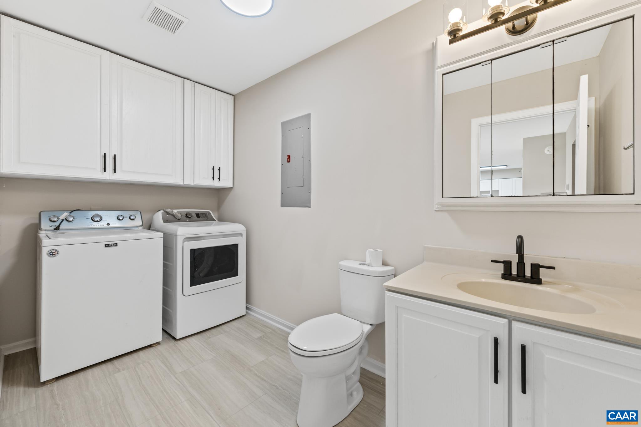 13259 Stonehouse Mountain Road Culpeper, VA 22701 - Photo 13 of 31 a view of bathroom with a toilet sink and a mirror