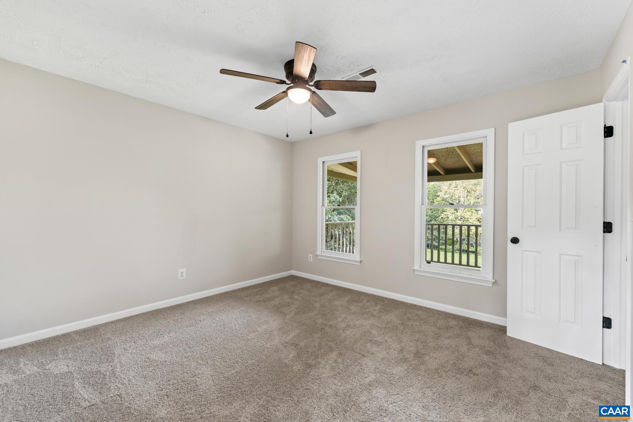 13259 Stonehouse Mountain Road Culpeper, VA 22701 - Photo 20 of 31 a view of an empty room with a window