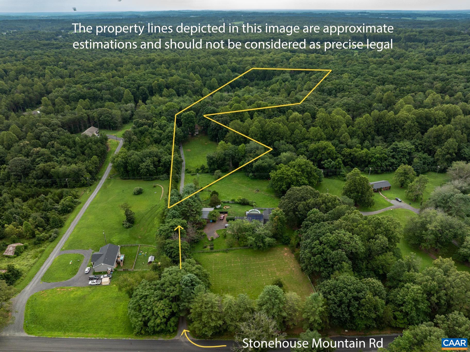 13259 Stonehouse Mountain Road Culpeper, VA 22701 - Photo 27 of 31 an aerial view of a houses with a yard