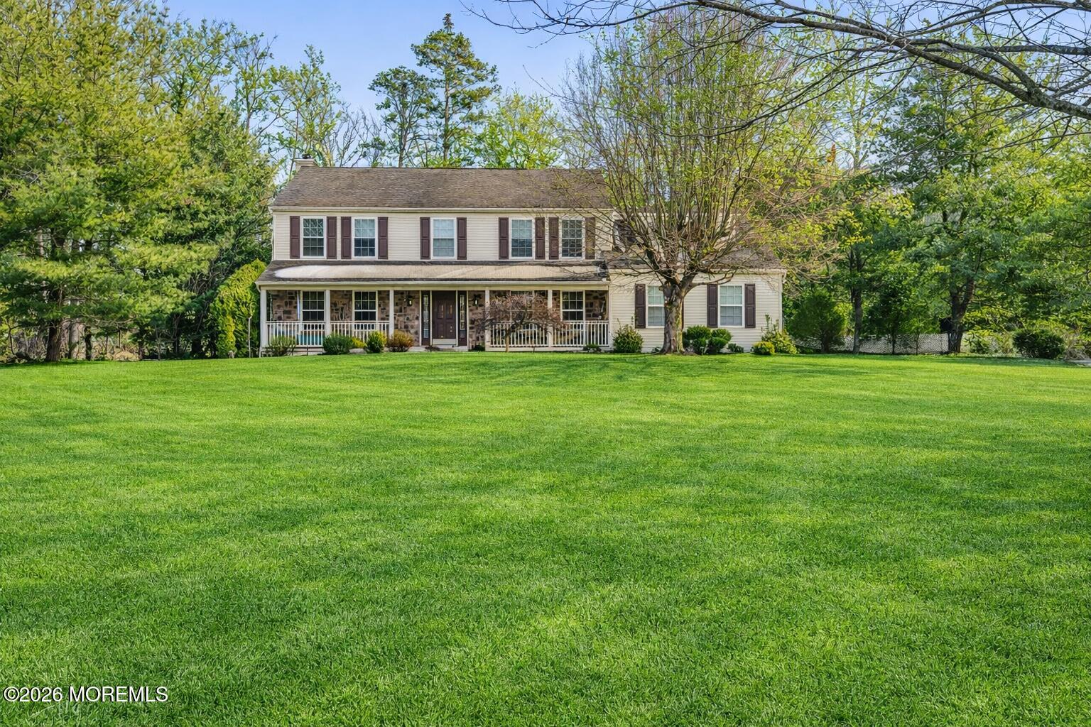 a view of a house with a big yard