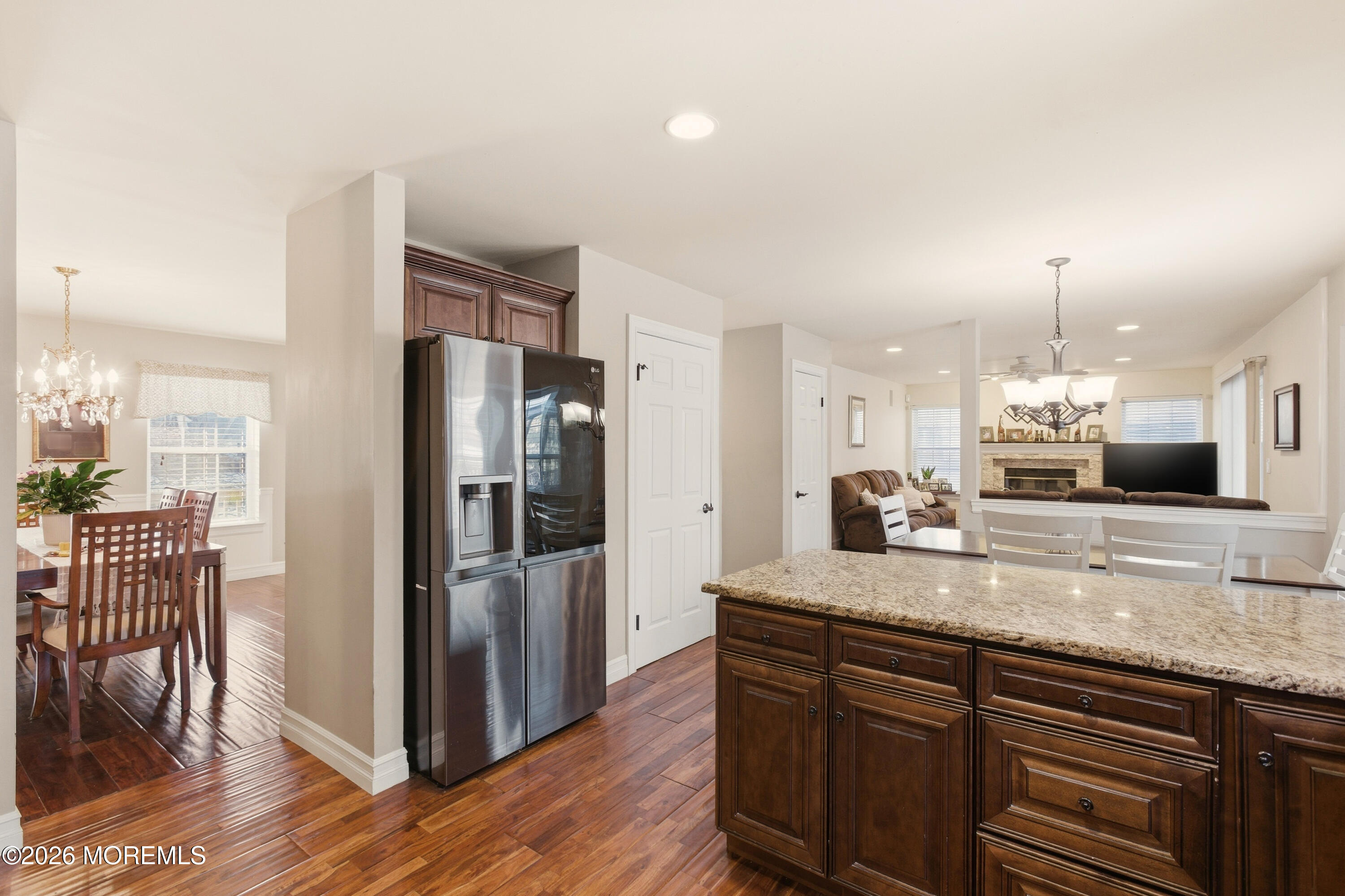 3 Arrowhead Circle Jackson, NJ 08527 - Photo 14 of 34 a kitchen with stainless steel appliances granite countertop a refrigerator a sink a stove and a wooden floors