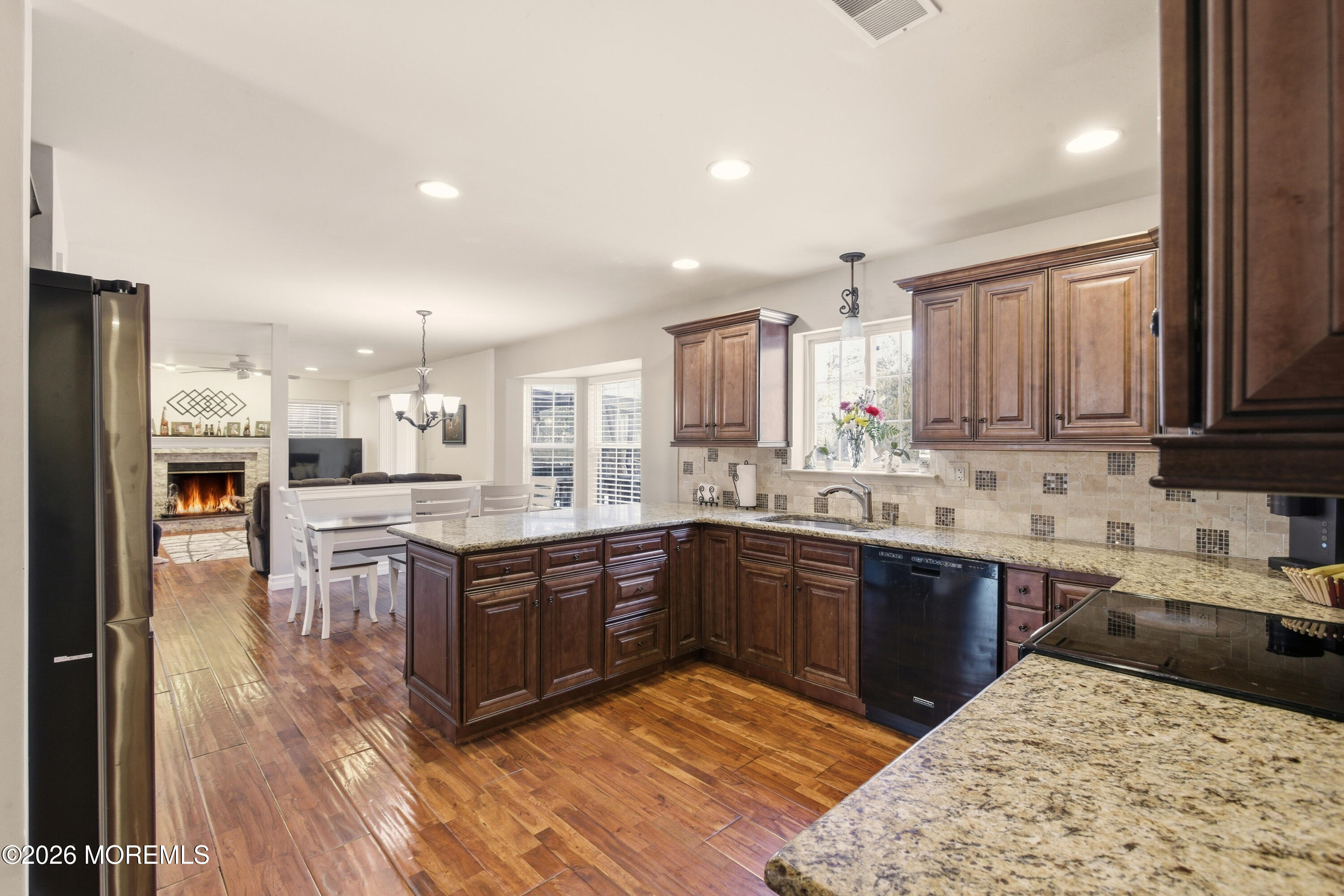 3 Arrowhead Circle Jackson, NJ 08527 - Photo 15 of 34 a kitchen with stainless steel appliances granite countertop a sink stove and refrigerator