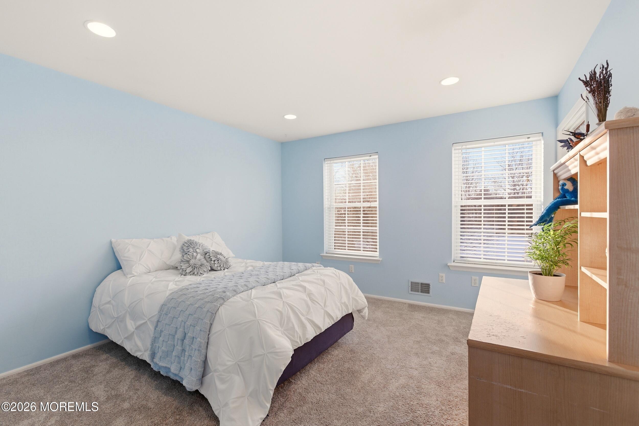 3 Arrowhead Circle Jackson, NJ 08527 - Photo 22 of 34 a bedroom with a bed and a large window