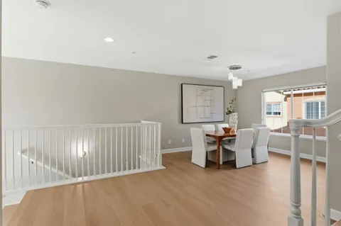 a bedroom with a bed and a lamp