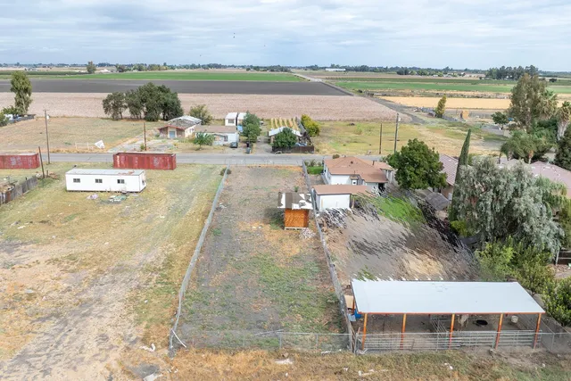swimming pool view with a lake view