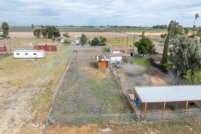 a view of a city with lawn chairs