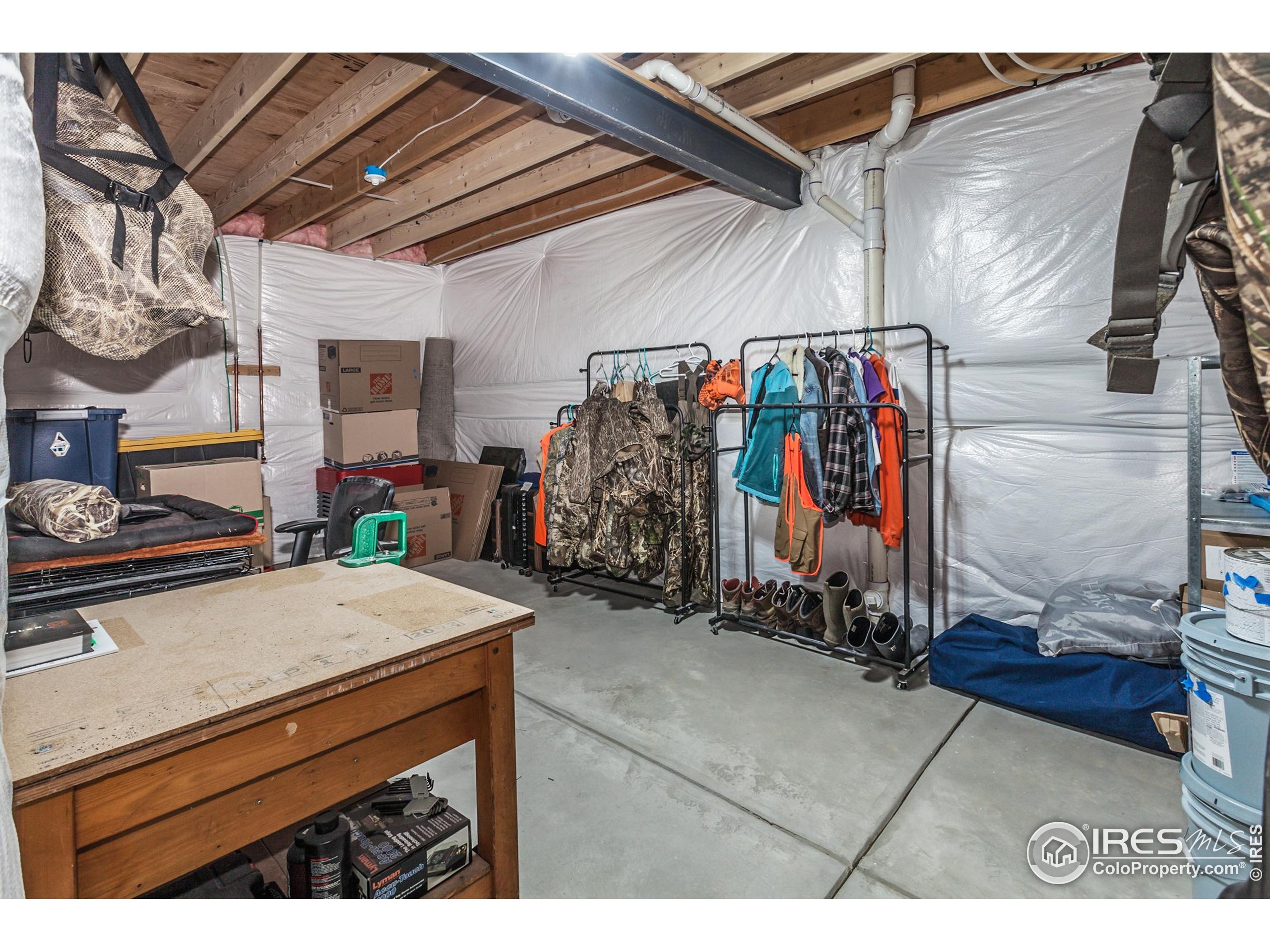 1231 105th Avenue Greeley, CO 80634 - Photo 36 of 43 a view of storage and utility room