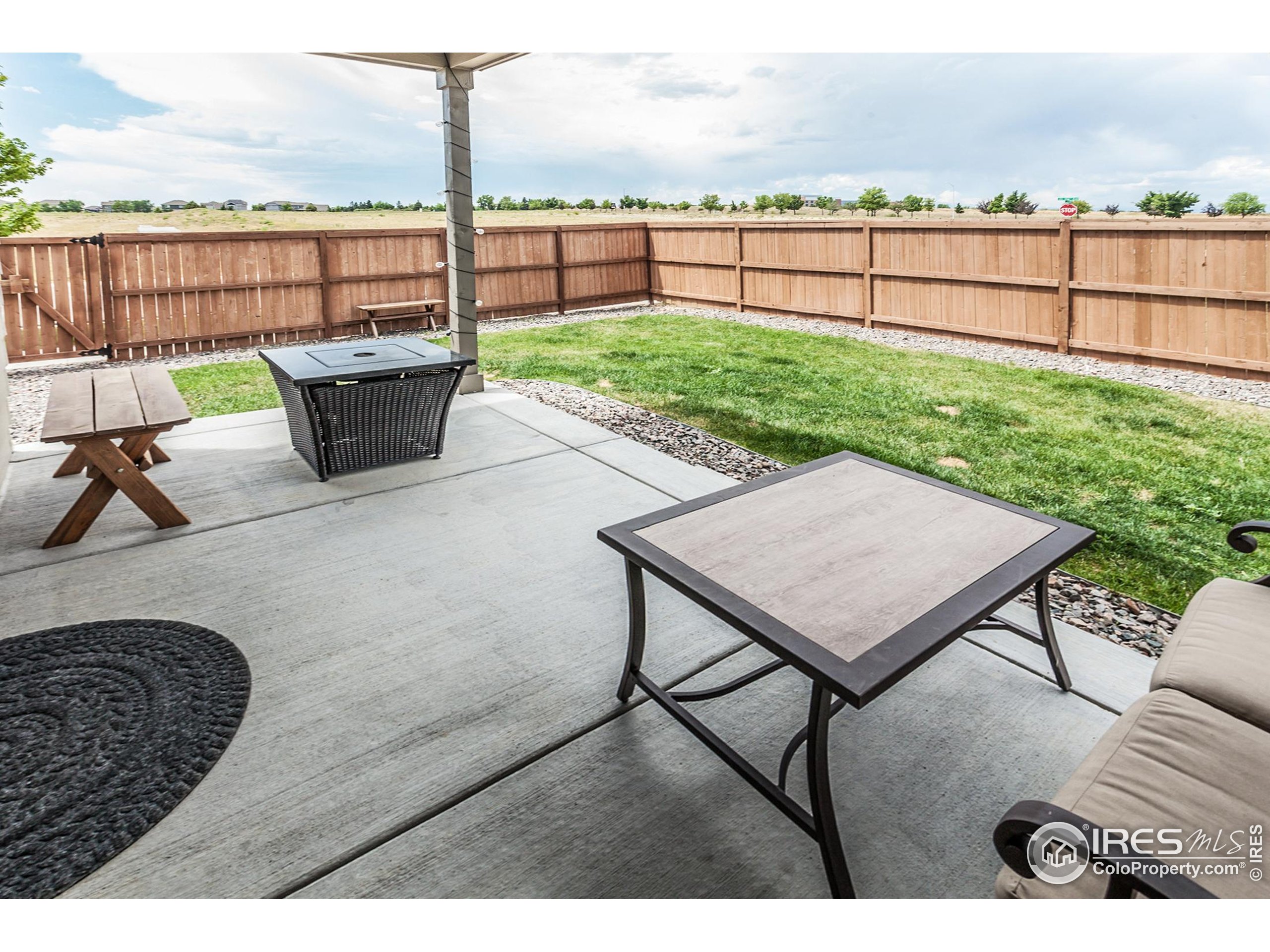 1231 105th Avenue Greeley, CO 80634 - Photo 37 of 43 a view of a terrace with furniture