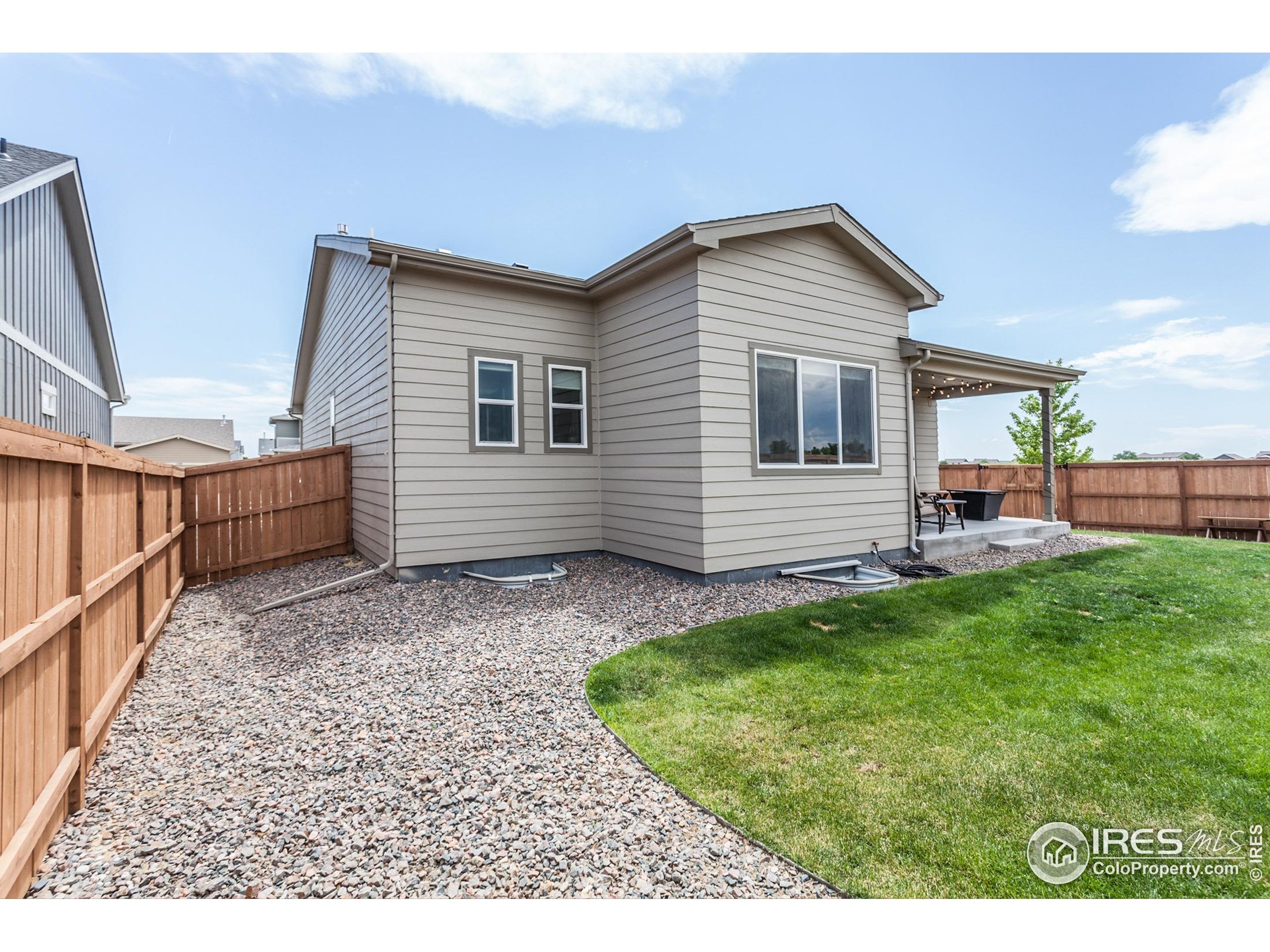 1231 105th Avenue Greeley, CO 80634 - Photo 40 of 43 a house view with a backyard space