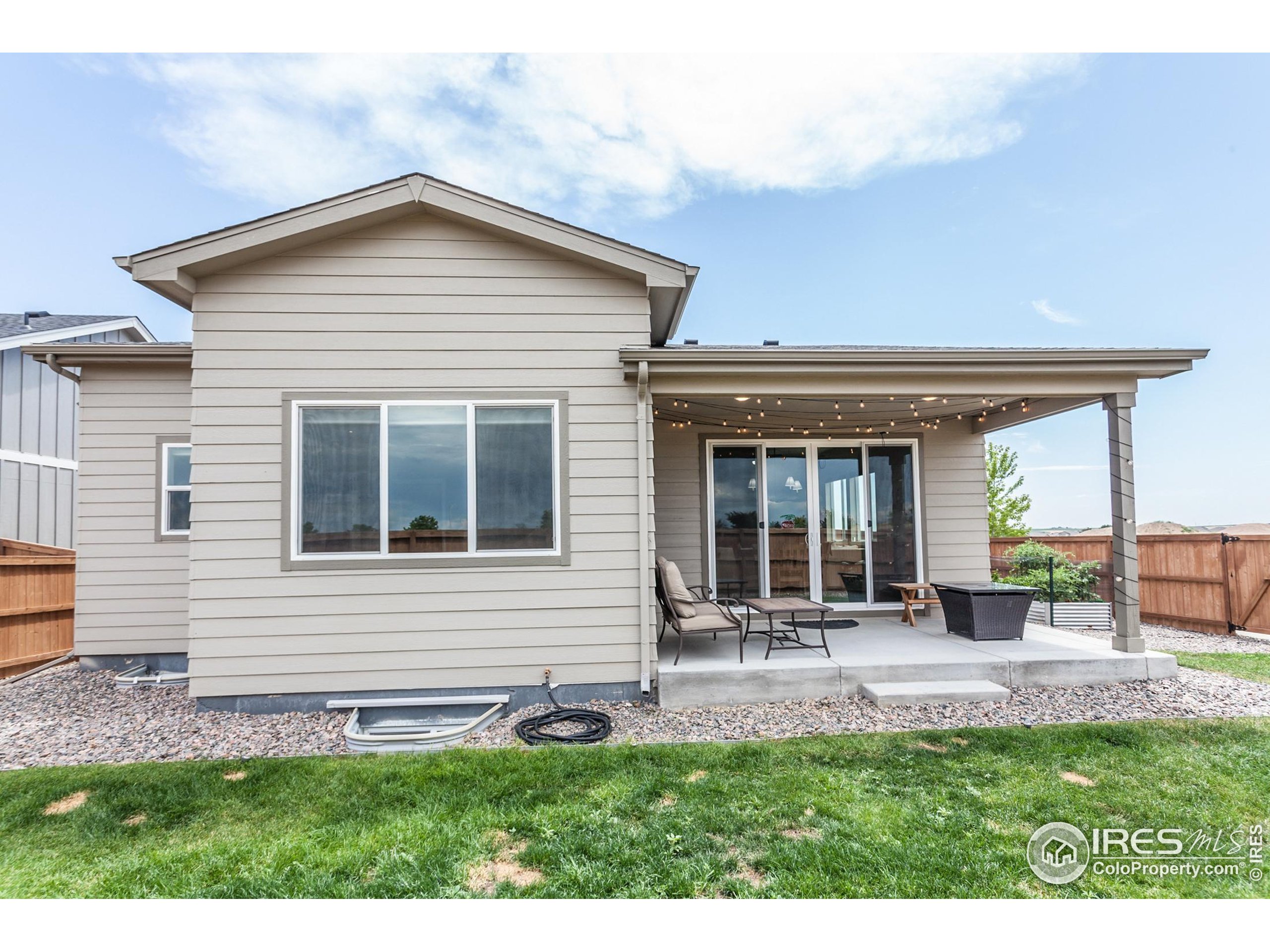 1231 105th Avenue Greeley, CO 80634 - Photo 41 of 43 a front view of a house with a yard