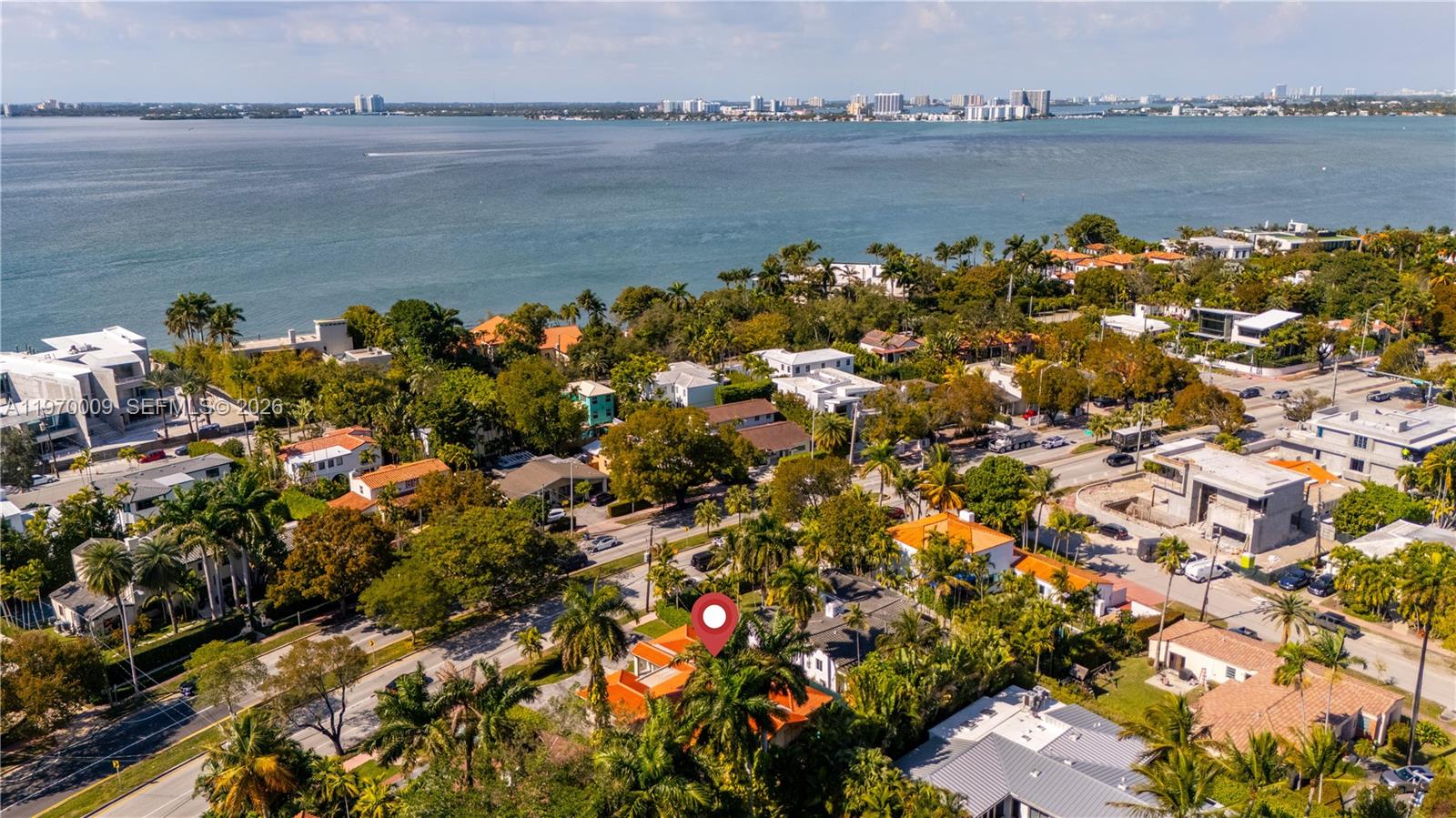 4555 Alton Road Miami Beach, FL 33140 - Photo 32 of 34 a view of a lake with a lake