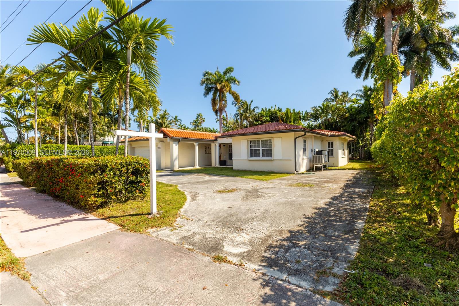 4555 Alton Road Miami Beach, FL 33140 - Photo 34 of 34 a front view of a house with a porch