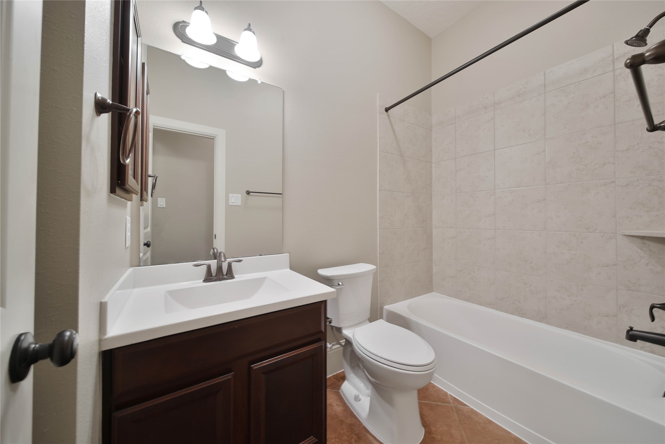 1215 Jake Springs Court Spring, TX 77386 - Photo 26 of 49 Two secondary bathrooms down makes sharing a breeze. This one is easily accessible to guests and used by the 3rd secondary bedroom.