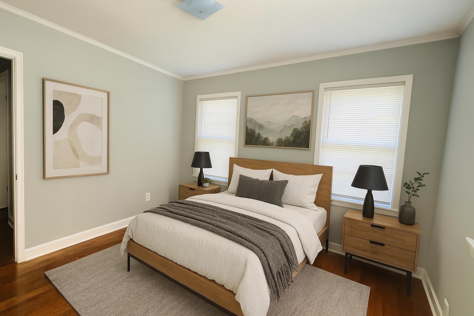 3579 Powell Avenue Memphis, TN 38122 - Photo 3 of 18 a bedroom with a bed and a painting on the wall