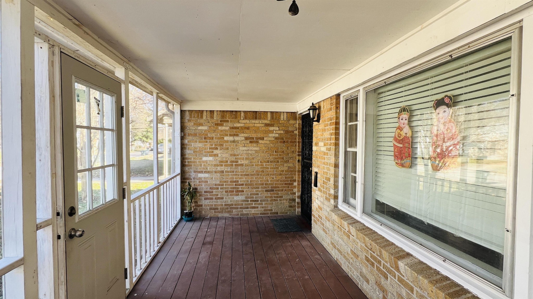 3579 Powell Avenue Memphis, TN 38122 - Photo 4 of 18 a view of a room with wooden floor and windows