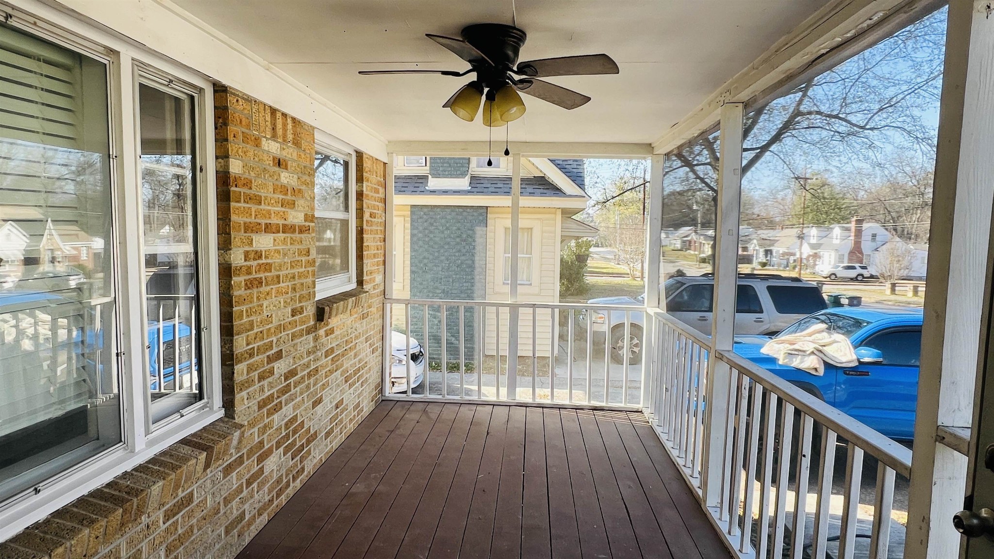3579 Powell Avenue Memphis, TN 38122 - Photo 5 of 18 a view of a porch with wooden floor and outdoor space
