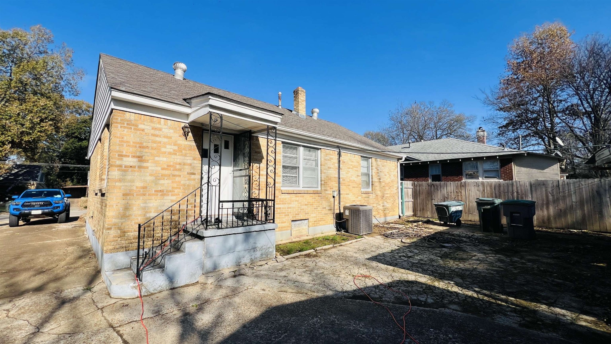 3579 Powell Avenue Memphis, TN 38122 - Photo 6 of 18 a front view of a house with a yard