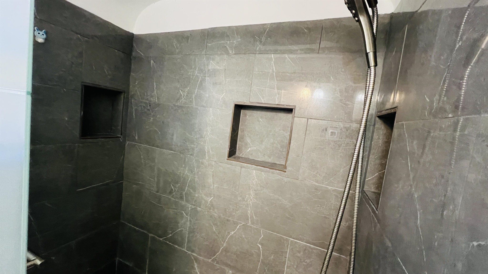 3579 Powell Avenue Memphis, TN 38122 - Photo 9 of 18 a bathroom with a shower