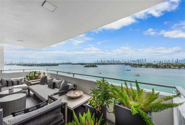 a view of a terrace with furniture