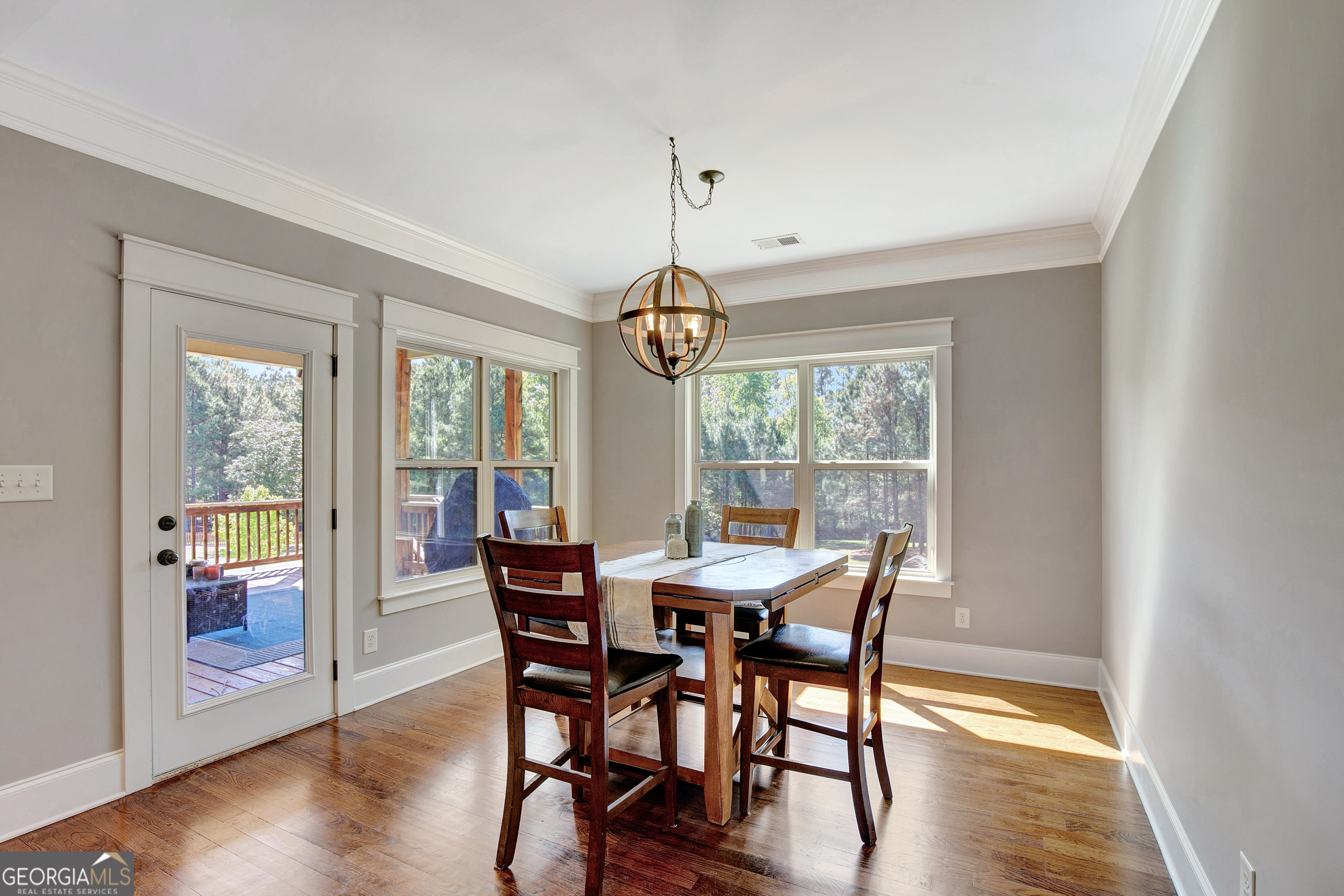 137 Kenmare Row Tyrone, GA 30290 - Photo 75 of 91 a view of a dining room with furniture window and wooden floor